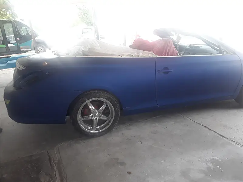Blue auto before transformation, untouched prior to new paint.