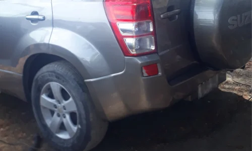 Restored silver SUV rear bumper after professional collision repair and paint matching. Garage G&G.